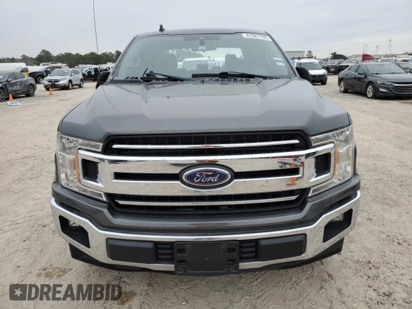 2020 Ford F-150 XL with VIN 1FTEW1CB1LKD56067, listed as a Copart auction lot 87887395 with 106,980 mi miles and Salvage Title. Bid and sale history available at carsss.com. Image 5.