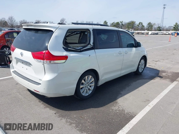 2011 Toyota Sienna XLE AAS with VIN 5TDYK3DC8BS085477, listed as a IAAI auction lot 41934541 with 131,768 mi miles and . Bid and sale history available at DreamBid. Image 4.