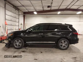 2019 Infiniti QX60 Luxe with VIN 5N1DL0MMXKC565309, listed as a IAAI auction lot 42184987 with 129,985 mi miles and . Bid and sale history available at DreamBid. Image 15.