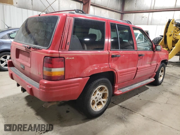 1996 Jeep Grand Cherokee Limited with VIN 1J4GZ78Y3TC186413, listed as a Copart auction lot 82370854 with 261,630 mi miles and Salvage Title. Bid and sale history available at carsss.com. Image 3.