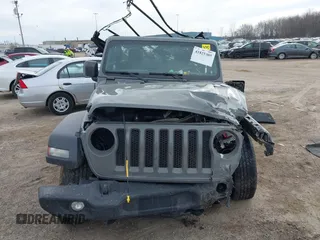 2018 Jeep Wrangler Sport S with VIN 1C4GJXAGXJW197483, listed as a IAAI auction lot 41825305 with 64,173 mi miles and . Bid and sale history available at DreamBid. Image 13.