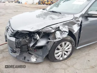 2012 Volkswagen Passat S with VIN 1VWAH7A31CC087907, listed as a IAAI auction lot 42083574 with 185,591 mi miles and . Bid and sale history available at DreamBid. Image 6.