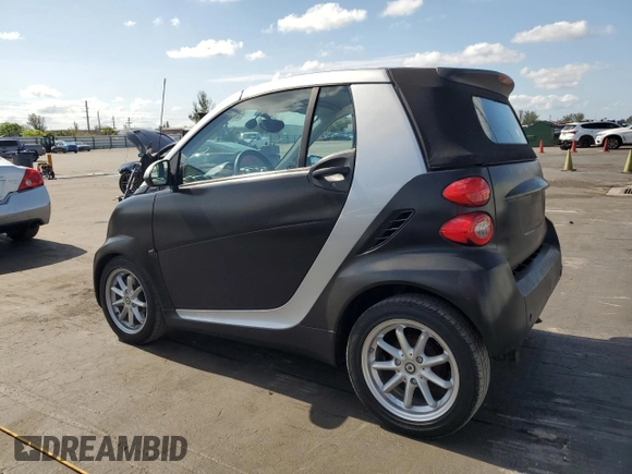 2009 Smart fortwo Passion with VIN WMEEK31X59K232027, listed as a Copart auction lot 55982195 with 63,945 mi miles and Salvage Title. Bid and sale history available at DreamBid. Image 2.