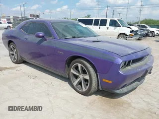 2014 Dodge Challenger R/T z VIN 2C3CDYBT0EH143576, wystawiony jako IAAI lot #42333984 z przebiegiem 189 874 mil mil oraz . Historia ofert i sprzedaży dostępna na DreamBid. Obrazek 1.