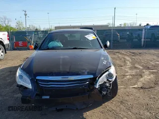 2011 Chrysler 200 Touring z VIN 1C3BC1FBXBN552307, wystawiony jako IAAI lot #42053190 z przebiegiem 162 138 mil mil oraz . Historia ofert i sprzedaży dostępna na DreamBid. Obrazek 13.