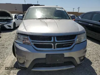 2017 Dodge Journey SXT z VIN 3C4PDDBG1HT578238, wystawiony jako Copart lot #61497045 z przebiegiem 132 179 mil mil oraz Szkoda całkowita • Salvage title. Historia ofert i sprzedaży dostępna na DreamBid. Obrazek 5.
