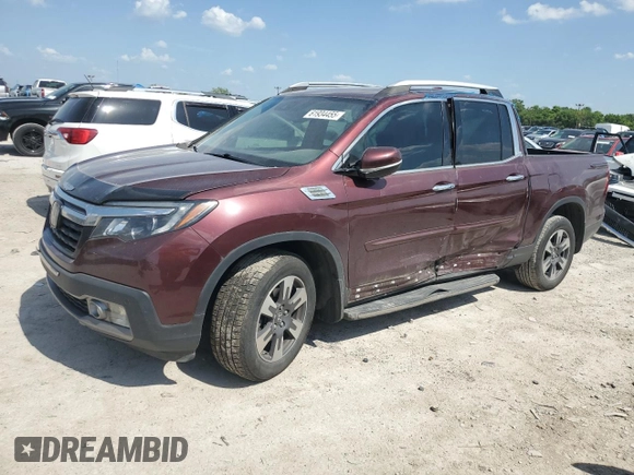 2019 Honda Ridgeline RTL-E with VIN 5FPYK3F71KB002046, listed as a Copart auction lot 61934455 with 131,674 mi miles and Salvage title. Bid and sale history available at DreamBid. Image 1.