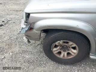 2002 Toyota 4Runner Limited with VIN JT3GN87R520229610, listed as a IAAI auction lot 41806628 with 338,035 mi miles. Bid and sale history available at carsss.com. Image 6.