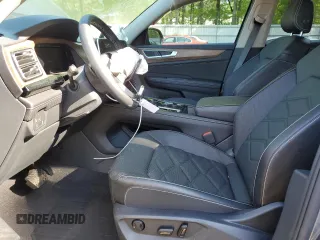2024 Volkswagen Atlas SE with VIN 1V2JR2CA1RC598507, listed as a Copart auction lot 52904865 with 9,075 mi miles and Salvage title. Bid and sale history available at DreamBid. Image 7.