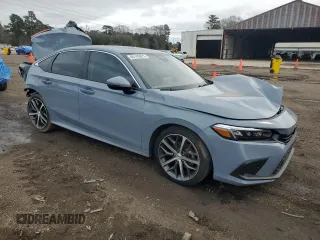 2023 Honda Civic Sedan Touring with VIN 2HGFE1F95PH313835, listed as a Copart auction lot 45145875 with 52,344 mi miles and Salvage Title. Bid and sale history available at carsss.com. Image 4.