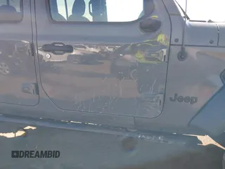 2020 Jeep Gladiator Sport S with VIN 1C6JJTAG6LL190749, listed as a IAAI auction lot 41401209 with 97,292 mi miles and . Bid and sale history available at DreamBid. Image 6.