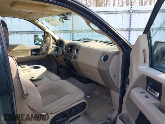 2005 Ford F-150 XLT with VIN 1FTPX14505FB72622, listed as a IAAI auction lot 41823532 with 165,918 mi miles. Bid and sale history available at carsss.com. Image 5.