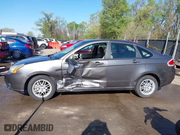 2011 Ford Focus SE with VIN 1FAHP3FN4BW118304, listed as a IAAI auction lot 42031650 with 60,031 mi miles and . Bid and sale history available at DreamBid. Image 14.