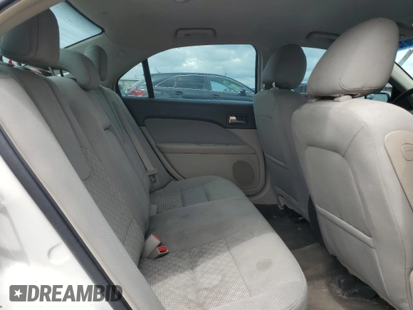 2012 Ford Fusion SE z VIN 3FAHP0HA1CR353093, wystawiony jako Copart lot #57113615 z przebiegiem 120 769 mil mil oraz Szkoda całkowita • Salvage title. Historia ofert i sprzedaży dostępna na DreamBid. Obrazek 10.