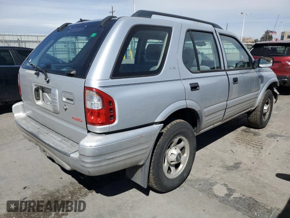 2000 Isuzu Rodeo z VIN 4S2DM58W8Y4331154, wystawiony jako Copart lot #49507535 z przebiegiem 198 476 mil mil oraz Szkody całkowita. Historia ofert i sprzedaży dostępna na DreamBid. Obrazek 3.