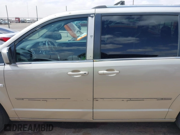 2014 Dodge Grand Caravan SXT with VIN 2C4RDGCG6ER466459, listed as a IAAI auction lot 41820907 with 105,404 mi miles and . Bid and sale history available at DreamBid. Image 13.