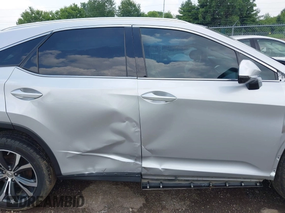 2017 Lexus RX 350 z VIN 2T2BZMCA9HC124727, wystawiony jako IAAI lot #42580173 z przebiegiem 106 749 mil mil oraz . Historia ofert i sprzedaży dostępna na DreamBid. Obrazek 14.