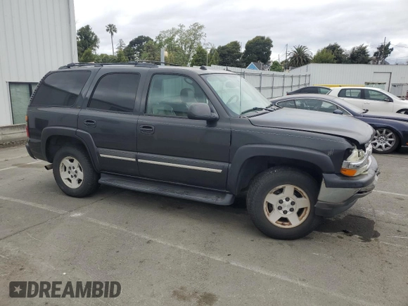 2005 Chevrolet Tahoe Z71 with VIN 1GNEC13T85R141076, listed as a Copart auction lot 54733415 with 310,992 mi miles and Salvage title. Bid and sale history available at DreamBid. Image 4.