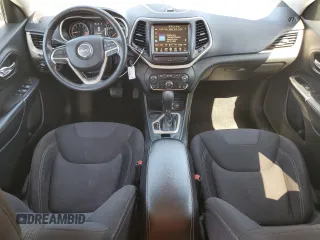 2015 Jeep Cherokee Latitude with VIN 1C4PJLCS0FW707387, listed as a Copart auction lot 48953465 with 140,965 mi miles and Salvage Title. Bid and sale history available at carsss.com. Image 8.