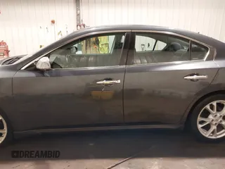 2013 Nissan Maxima SV with VIN 1N4AA5AP5DC801446, listed as a IAAI auction lot 41996092 with 124,823 mi miles and . Bid and sale history available at DreamBid. Image 15.