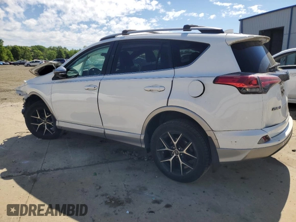 2018 Toyota RAV4 SE with VIN 2T3JFREV9JW801731, listed as a Copart auction lot 55866485 with 64,043 mi miles and Salvage title. Bid and sale history available at DreamBid. Image 2.