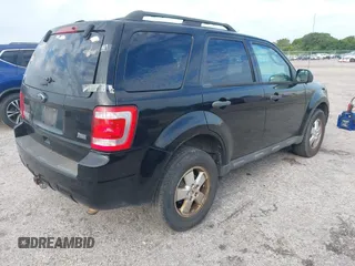 2012 Ford Escape XLT z VIN 1FMCU0DG6CKA42959, wystawiony jako IAAI lot #42770423 z przebiegiem 162 971 mil mil oraz . Historia ofert i sprzedaży dostępna na DreamBid. Obrazek 4.