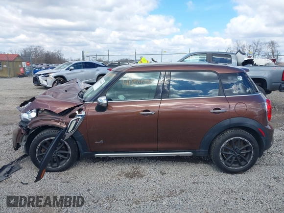 2016 MINI Countryman S z VIN WMWZC5C55GWU01180, wystawiony jako IAAI lot #41874470 z przebiegiem 194 997 mil mil oraz . Historia ofert i sprzedaży dostępna na DreamBid. Obrazek 14.