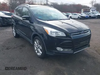 2014 Ford Escape Titanium with VIN 1FMCU9J98EUD73818, listed as a IAAI auction lot 42036442 with 129,794 mi miles. Bid and sale history available at carsss.com. Image 6.