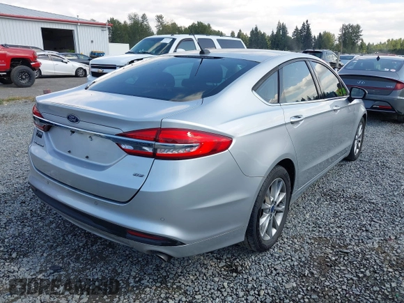 2017 Ford Fusion SE with VIN 3FA6P0H71HR377607, listed as a IAAI auction lot 42757989 with 93,003 mi miles and . Bid and sale history available at DreamBid. Image 4.