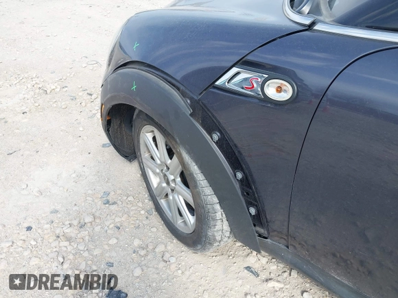 2013 MINI Coupe S with VIN WMWSX3C50DT466882, listed as a IAAI auction lot 42026938 with 99,499 mi miles and . Bid and sale history available at DreamBid. Image 12.