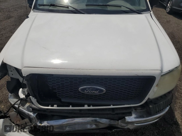 2005 Ford F-150 XL with VIN 1FTVF12585NA40842, listed as a Copart auction lot 61728465 with 288,002 mi miles and Salvage title. Bid and sale history available at DreamBid. Image 11.