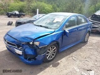 2015 Mitsubishi Lancer ES with VIN JA32U2FU6FU018490, listed as a IAAI auction lot 41960096 with 120,067 mi miles. Bid and sale history available at carsss.com. Image 2.
