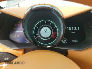2023 Aston Martin Vantage z VIN SCFSMGBW9PGP08760, wystawiony jako Copart lot #74983814 z przebiegiem 1916 mil mil oraz Nie do naprawy. Historia ofert i sprzedaży dostępna na DreamBid. Obrazek 9.