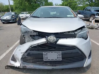 2018 Toyota Corolla L z VIN 2T1BURHE9JC067155, wystawiony jako IAAI lot #42492008 z przebiegiem 169 311 mil mil oraz . Historia ofert i sprzedaży dostępna na DreamBid. Obrazek 19.