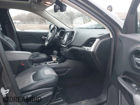 2014 Jeep Cherokee Limited with VIN 1C4PJMDS3EW137985, listed as a IAAI auction lot 41543651 with 131,312 mi miles. Bid and sale history available at carsss.com. Image 5.