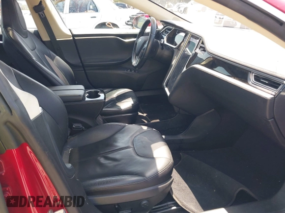 2014 Tesla Model S 60 with VIN 5YJSA1S11EFP33278, listed as a IAAI auction lot 42441781 with Not provided miles and . Bid and sale history available at DreamBid. Image 5.