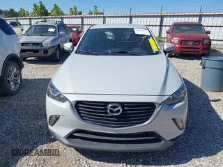 2018 Mazda CX-3 Touring z VIN JM1DKFC77J0331828, wystawiony jako IAAI lot #40482555 z przebiegiem 101 473 mil mil oraz . Historia ofert i sprzedaży dostępna na DreamBid. Obrazek 13.