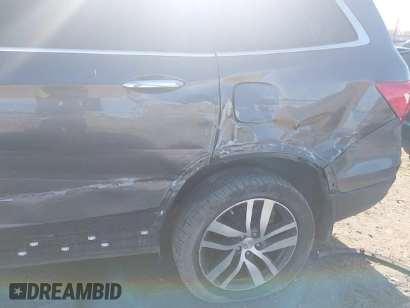 2017 Honda Pilot Touring with VIN 5FNYF5H97HB023919, listed as a IAAI auction lot 41864959 with 70,360 mi miles. Bid and sale history available at carsss.com. Image 19.
