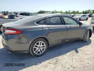 2015 Ford Fusion SE with VIN 3FA6P0HD8FR230364, listed as a Copart auction lot 52631195 with 196,285 mi miles and Salvage title. Bid and sale history available at DreamBid. Image 3.