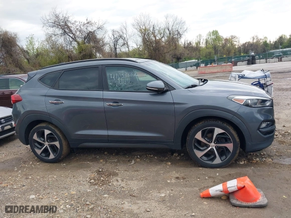 2016 Hyundai Tucson Limited with VIN KM8J3CA27GU088248, listed as a IAAI auction lot 42033882 with 102,112 mi miles. Bid and sale history available at carsss.com. Image 13.