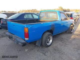 1993 Nissan Trucks 2WD with VIN 1N6SD11S1PC310246, listed as a IAAI auction lot 41838011 with 219,398 mi miles. Bid and sale history available at carsss.com. Image 4.