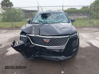 2024 Cadillac XT4 AWD Premium Luxury с VIN 1GYFZDR44RF147956, выставлен на аукционе IAAI как лот 42434595 с пробегом 26 328 миль миль и . История ставок и продаж доступна на DreamBid. Изображение 12.