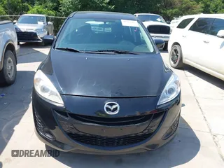 2012 Mazda 5 Sport z VIN JM1CW2BL0C0142657, wystawiony jako IAAI lot #42389495 z przebiegiem 107 790 mil mil oraz . Historia ofert i sprzedaży dostępna na DreamBid. Obrazek 6.