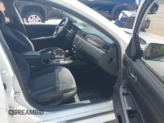 2014 Chevrolet Impala LS with VIN 2G1WA5E30E1161444, listed as a IAAI auction lot 42365750 with 184,112 mi miles and . Bid and sale history available at DreamBid. Image 5.