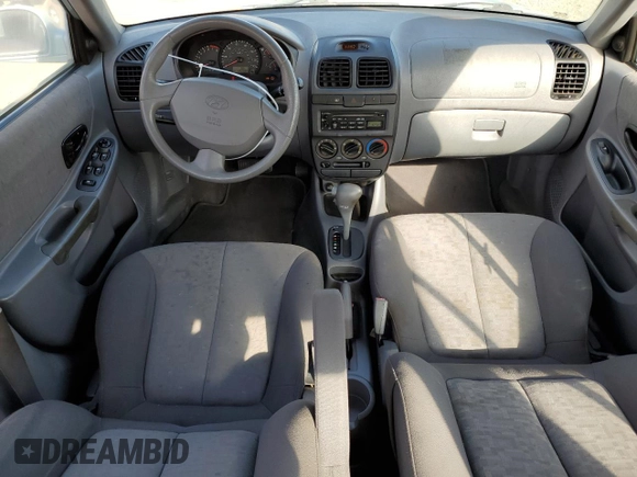 2003 Hyundai Accent GL with VIN KMHCG45C13U429952, listed as a Copart auction lot 77835874 with 120,554 mi miles and Salvage Title. Bid and sale history available at carsss.com. Image 8.