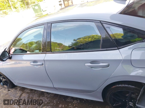 2022 Honda Civic Si with VIN 2HGFE1E52NH474042, listed as a IAAI auction lot 42099415 with 26,828 mi miles and . Bid and sale history available at DreamBid. Image 14.