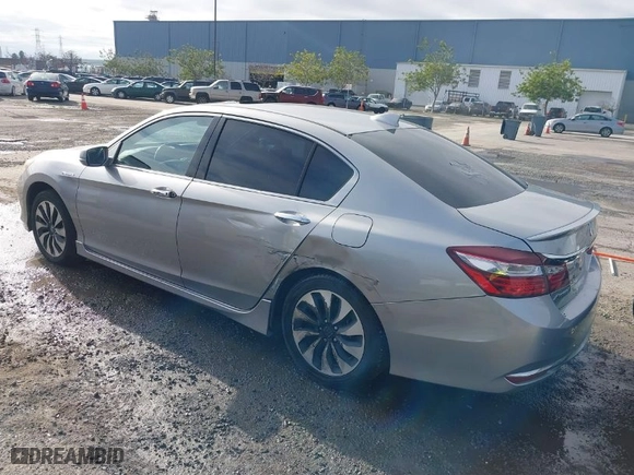 2017 Honda Accord Hybrid Touring with VIN JHMCR6F7XHC006357, listed as a IAAI auction lot 41263478 with 118,758 mi miles. Bid and sale history available at carsss.com. Image 3.