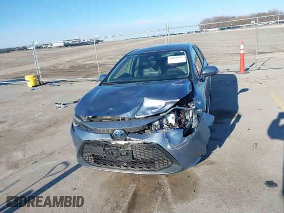 2023 Toyota Corolla Hybrid LE with VIN JTDBCMFEXPJ014034, listed as a IAAI auction lot 41865829 with 33,210 mi miles and . Bid and sale history available at carsss.com. Image 6.