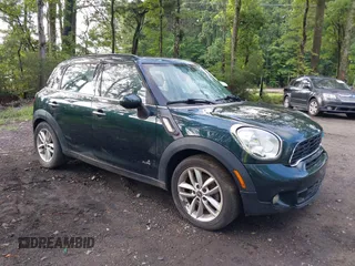 2013 MINI Countryman S ALL4 with VIN WMWZC5C50DWP32695, listed as a IAAI auction lot 42721945 with 116,965 mi miles and . Bid and sale history available at DreamBid. Image 1.