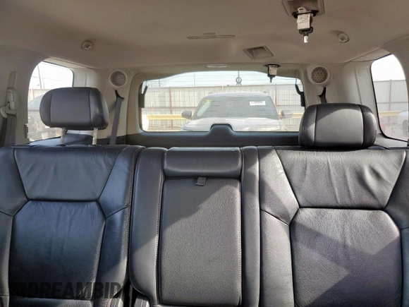 2011 Honda Pilot Touring z VIN 5FNYF3H98BB005411, wystawiony jako Copart lot #52392765 z przebiegiem 155 541 mil mil oraz Szkoda całkowita • Salvage title. Historia ofert i sprzedaży dostępna na DreamBid. Obrazek 10.